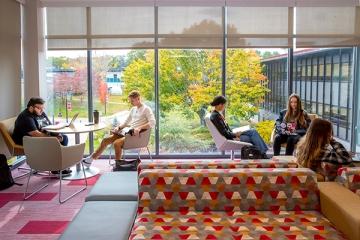 Students studying in cheerful lounge